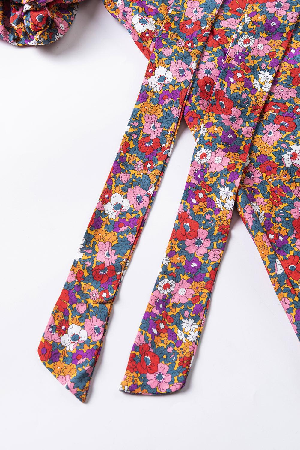 بلوزة أرجوانية مطبوعة برقبة عالية وأكمام منفوخة للسيدات